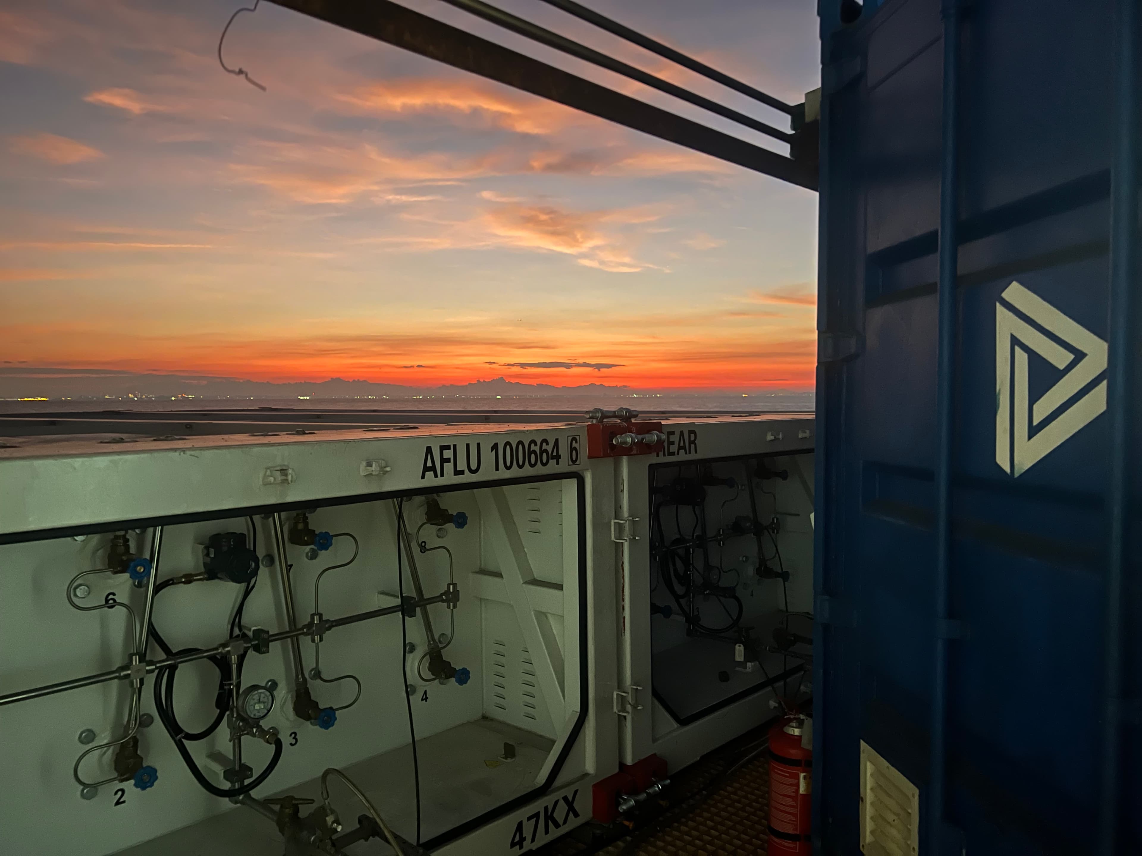 Newlight containerized hydrogen equipment at sunset