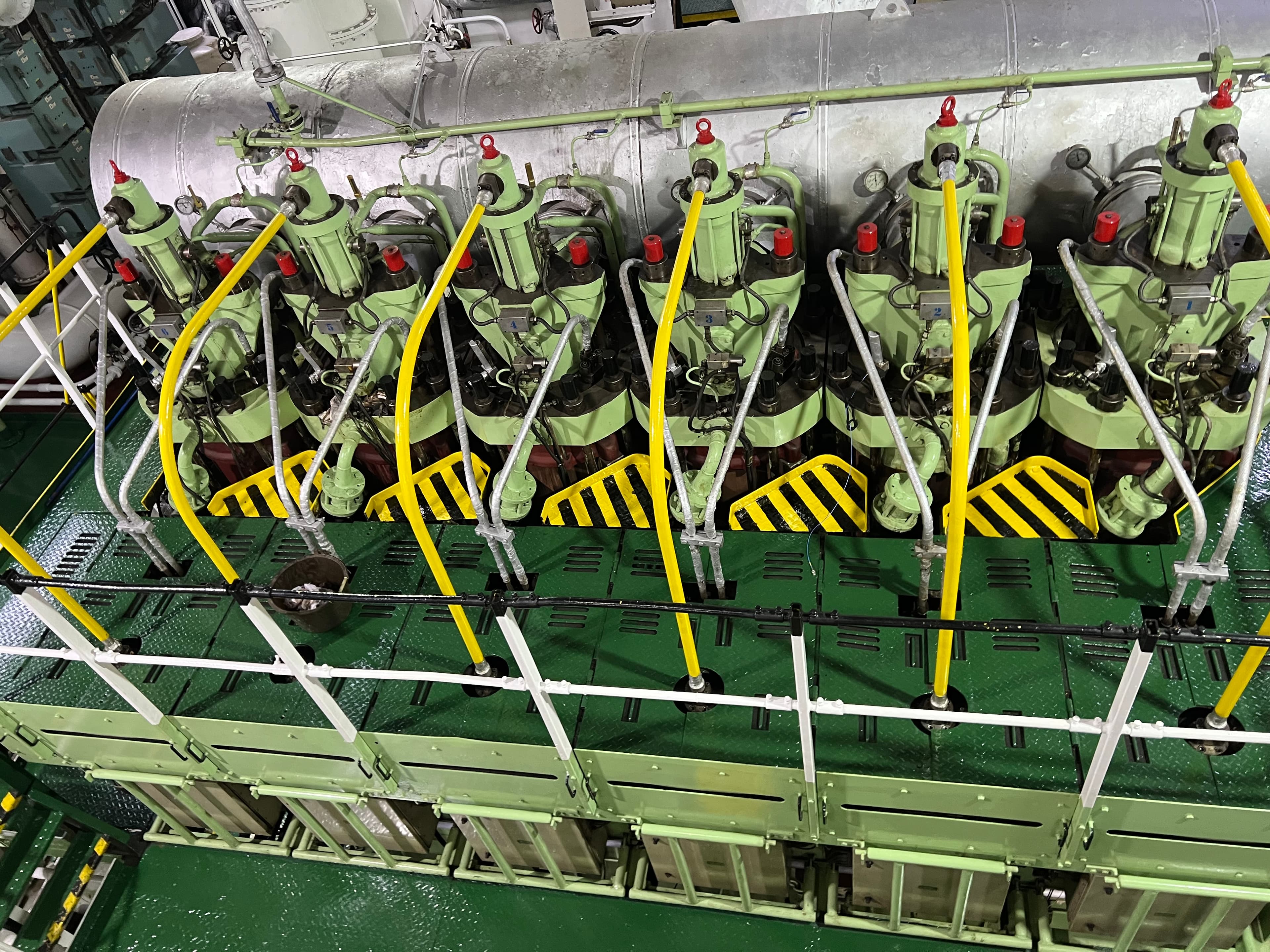 Marine engine room machinery being inspected before retrofit design