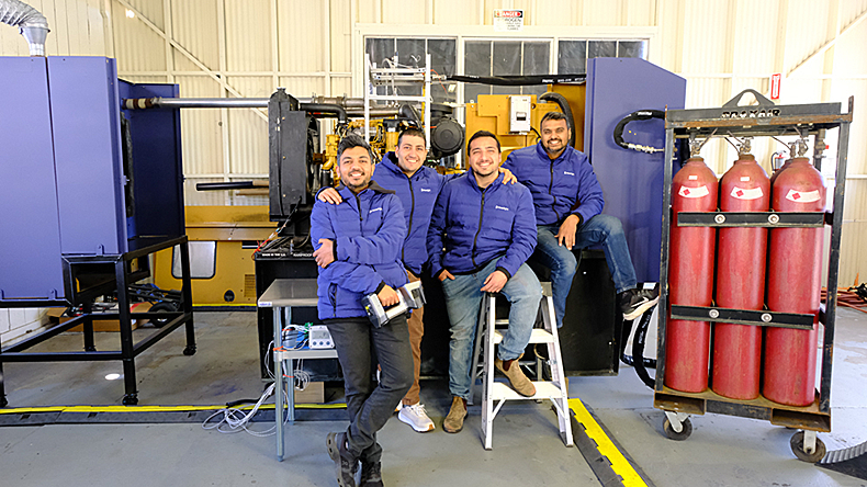 Newlight Marine Technologies team beside its test system